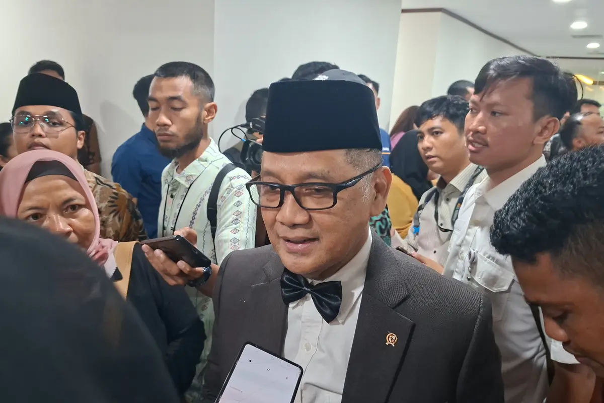 Menteri Haji dan Umrah, Mochamad Irfan Yusuf di Kantor Kementerian Koordinator Bidang Pangan, Jakarta, Selasa (21/4/2026). (Foto: Liputan6.com/Arief RH)