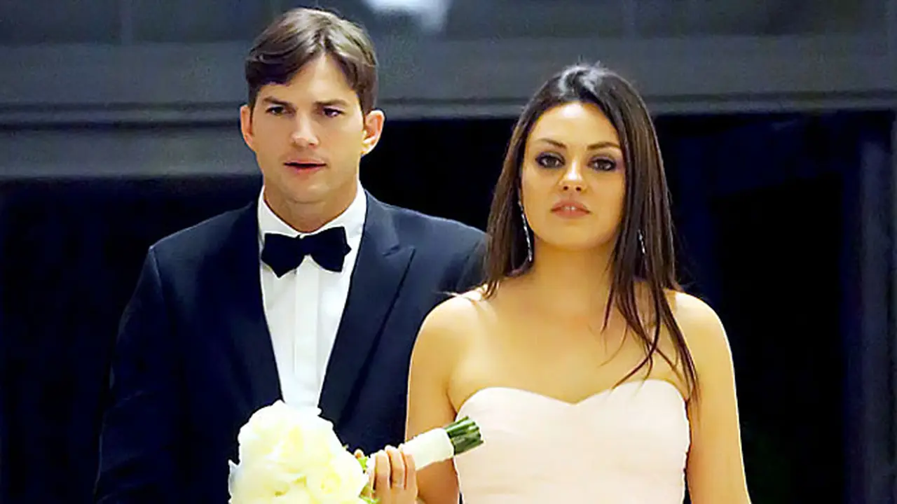 aston-kunis-131210b.jpg
