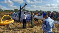 Insiden jatuhnya helikopter yang dioperasikan oleh PT Carpediem Air di Desa Kawo, Pujut, Lombok Tengah, Minggu (14/7/2019). (Dok Kemenhub)