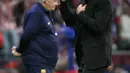 Unggul agregat 3-2 atas Barcelona memastikan langkah tim racikan pelatih Diego Simeone ini ke semifinal Liga Champions 2025/2026. Tampak dalam foto, pelatih Atletico Madrid, Diego Simeone (kanan) merayakan merayakan kemenangan di akhir pertandingan leg kedua perempat final Liga Champions 2025/2026 melawan FC Barcelona di Stadion Metropolitano, Madrid pada Selasa 14 April 2026 waktu setempat atau Rabu (15/4/2026) dini hari WIB. (Javier SORIANO/AFP)