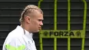 Erling Haaland itu mengubah gaya rambutnya. Pemain asal Norwegia itu tetap membiarkan rambutnya panjang. Namun, eks pemain Dortmund itu mengepang rambutnya. Bukan satu kepang, akan tetapi dua. (AFP/Paul Ellis)