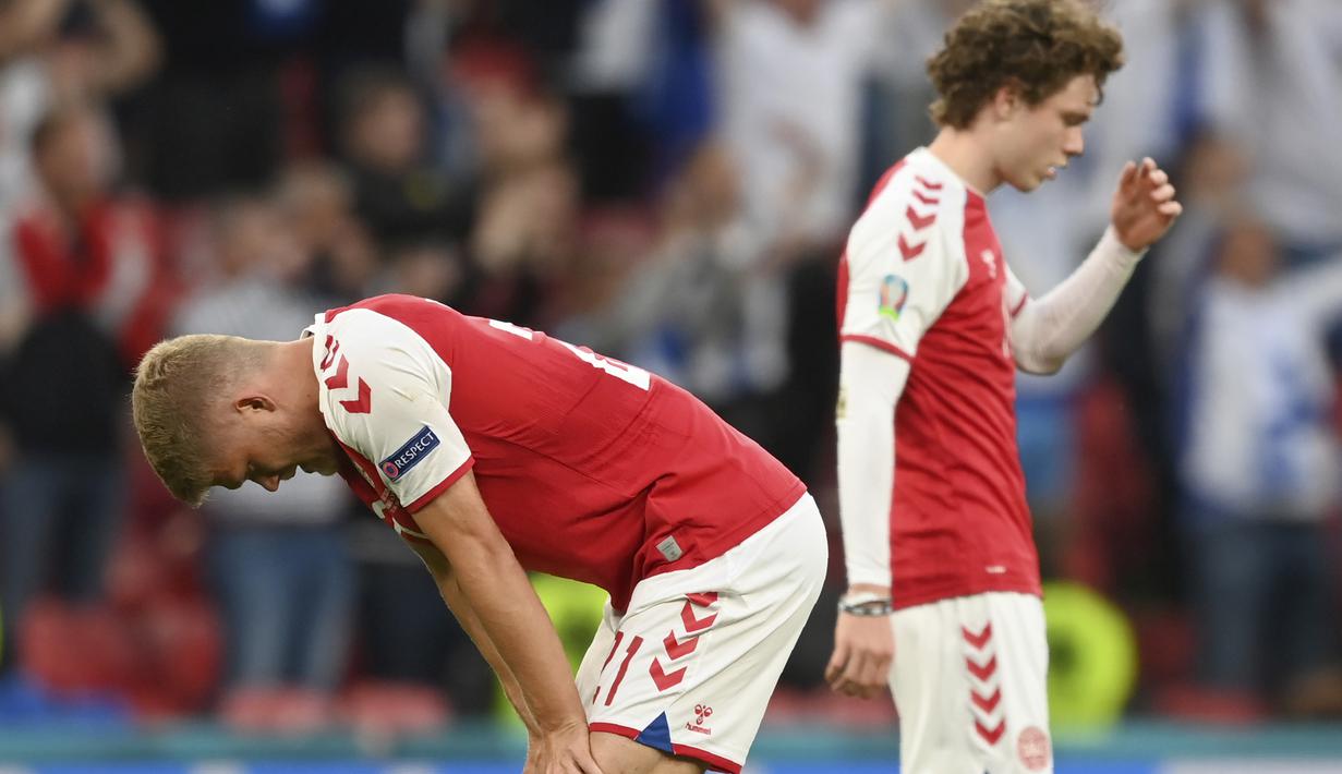 Usai itu, Denmark terus menggempur pertahanan Finlandia hingga laga usai. Disiplinnya pertahanan Finlandia membuat skor tetap 1-0 untuk kemenangan Finlandia. (Foto: AP/Stuart Franklin/Pool)