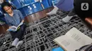 Taman di tengah-tengah pusat perbelanjaan tersebut bisa menjadi hiburan tersendiri. (Liputan6.com/Johan Tallo)