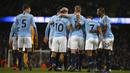 Para pemain Manchester City merayakan gol ke gawang Wolverhampton Wanderers pada laga Premier League di Stadion Etihad, Manchester, Senin (14/1). Manchester City menang 3-0 atas Wolverhampton Wanderers. (AP/Dave Thompson)