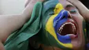 Ekspresi seorang fans usai timnya dikalahkan Jerman 1-7 pada babak semifinal Piala Dunia 2014, Selasa (8/7/14). (REUTERS/Ueslei Marcelino)