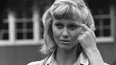 Olivia Newton-John pada 1977. (AP Photo/Nick Ut, File)