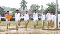 Top 3 Berita Hari Ini: Semangat Kibarkan Bendera Meski Berlumpur