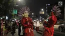 Ondel-ondel ramaikan pawai obor di kawasan Mampang Prapatan, Jakarta, Sabtu (12/5). Pawai obor berkeliling dari Pejatan sampai Warung Buncit menyambut Ramadan 1439 H. (Liputan6.com/Herman Zakharia)