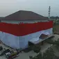 Bentangkan bendera merah putih raksasa menyelimuti seluruh gedung, Polresta Tangerang dapat penghargaan dari Lembaga Prestasi Indonesia Dunia (Leprid).