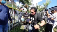Pelaku Penembakan Perwira Tinggi Polda Gorontalo Peragakan 19 Adegan (Arfandi/Liputan6.com)