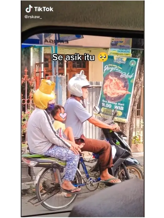 Pakai Helm Unik, Pasutri Ini Berboncengan Naik Sepeda yang Dirakit Bak Motor