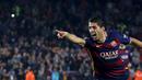 Selebrasi Luis Suarez setelah mencetak gol kedua ke gawang Eibar dalam laga La Liga Spanyol di Stadion Camp Nou, Barcelona, Senin (26/10/2015) dini hari WIB. (Reuters/Albert Gea)