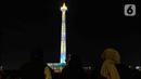 Pagelaran video mapping di Monas hadir untuk memeriahkan libur Natal dan tahun baru. (Liputan6.com/Herman Zakharia)
