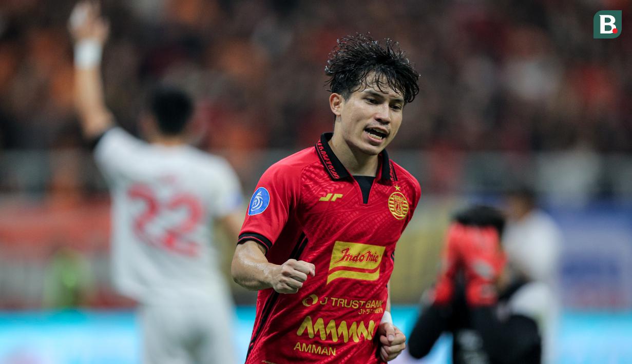 <p>Pemain Persija Jakarta, Ryo Matsumura melakukan selebrasi setelah mencetak gol ke gawang Persis Solo pada laga lanjutan BRI Liga 1 2024/2025 di Jakarta International Stadium (JIS), Jakarta Utara, Sabtu (24/08/2024). (Bola.com/Bagaskara Lazuardi)</p>