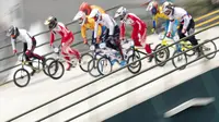 Pebalap sepeda BMX Indonesia, I Gusti Bagus Saputra, saat berlaga pada Asian Games di Pulomas International BMX Center, Jakarta, Sabtu (25/8/2018). Bagus Saputra meraih medali perak dengan catatan waktu 34,314 detik. (Bola.com/Peksi Cahyo)