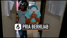 Polisi Ternate menangkap pria yang diduga kerap mencuri handphone dan barang berharga dengan menggunakan pakaian wanita lengkap dengan hijab dan cadar.