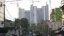 Suasana pembangunan Rumah Susun Sewa Tingkat Tinggi Pasar Rumput, Jakarta Selatan, Sabtu (6/10). Rusun yang ditargetkan rampung pada Desember 2018 memiliki 1.984 unit dan diprioritaskan untuk warga relokasi. (Liputan6.com/Immanuel Antonius)