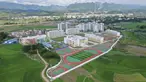Foto dari udara memperihatkan lokasi pemukiman kembali di Kota Silin, Wilayah Tiandong, Daerah Otonom Etnis Zhuang Guangxi, China selatan, 28 Agustus 2019. Dalam lima tahun terakhir, Daerah Otonom Etnis Zhuang Guangxi telah melakukan serangkaian proyek pengentasan kemiskinan. (Xinhua/Cao Yiming)
