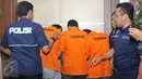Polda Metro Jaya berhasil membongkar kasus pengemplang pajak daerah, Jakarta, Kamis (17/12/2015). Polisi menyita barang bukti uang senilai Rp45 Juta, 1 mobil, 2 laptop dan 4 ponsel terkait kasus tindak pidana tersebut. (Liputan6.com/Gempur M Surya)