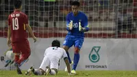 5. Kurniawan Kartika Ajie akan menjadi pilihan utama di bawah mistar gawang Timnas Indonesia U-22. Pemain Persiba Balikpapan ini tampil impresif sepanjang babak penyisihan grup. (Bola.com/Vitalis Yogi Trisna)