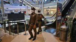 Seorang anak laki-laki berusia 14 tahun ditangkap pada 3 Oktober setelah melakukan penembakan di sebuah mal di Bangkok. (Lillian SUWANRUMPHA/AFP)