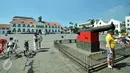 Kawasan Kota Tua Jakarta menjadi pilihan tempat wisata murah meriah saat libur lebaran. Kawasan tersebut dikenal dengan koleksi bangunan tua peninggalan Belanda. (Liputan6.com/Faizal Fanani)