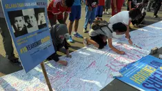 Ribuan orang berpatisipasi dalam 'Aksi Damai 5.000 Tandatangan Suarakan Hak-hak Sipil dan Anak-Perempuan' di Jakarta, (24/8/2014). (Liputan6.com/Herman Zakharia)
