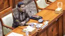 Calon Anggota Komisi Nasional Hak Asasi Manusia (Komnas HAM) 2022-2027 Amiruddin saat mengikuti uji kelayakan dan kepatutandengan Komisi III DPR RI di Kompleks Parlemen, Senayan, Jakarta, Jumat, (30/9). Sebanyak 14 calon anggota Komnas HAM akan mengikuti uji kelayakan dan kepatutan di Komisi III DPR. (Liputan6.com/Angga Yuniar)