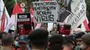 Sejumlah mahasiswa yang tergabung dalam Front Millenial Jabodetabek melakukan aksi unjuk rasa di Jalan Kuningan Persada sekitar Gedung KPK, Jakarta, Kamis (9/12/2021). Aksi mereka untuk memperingati Hakordia 2021 dengan menyuarakan keprihatinan atas lemahnya KPK. (Liputan6.com/Helmi Fithriansyah)