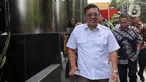 Kepala Badan Pangan Nasional (Bapanas) Arief Prasetyo Adi berjalan meninggalkan Gedung Merah Putih Komisi Pemberantasan Korupsi (KPK) Jakarta, Jumat (2/2/2024). (Liputan6.com/Herman Zakharia)