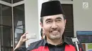 Gatot Brajamusti atau Aa Gatot tersenyum usai menjalani sidang lanjutan di Pengadilan Negeri Jakarta Selatan, Selasa (5/12). Sidang memanggil saksi aktris Nadine Chandrawinata. (Liputan6.com/Herman Zakharia)