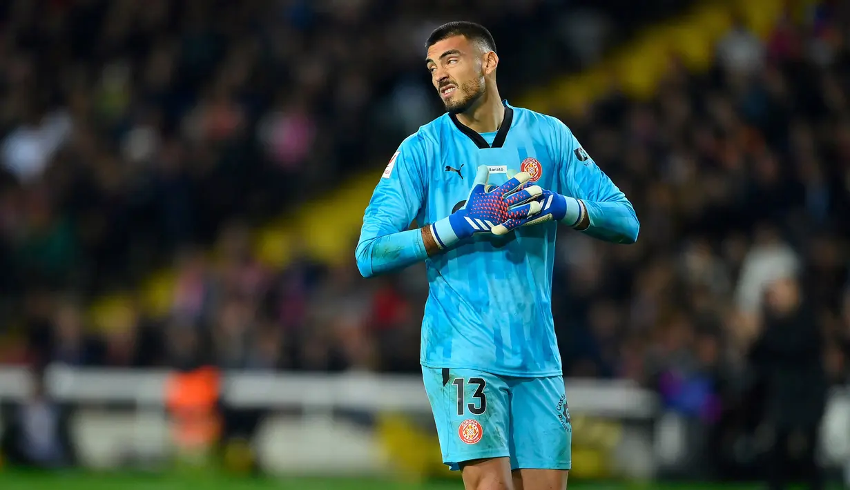 Paulo Gazzaniga menjadi sosok tak tergantikan di bawah mistar gawang Girona. Kiper berkebangsaan Argentina itu bermain penuh 16 pertandingan di Liga Spanyol musim ini. (AFP/Pau Barrena)