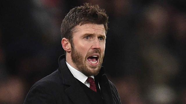 Legenda lini tengah Old Trafford itu akan memimpin The Red Devils hingga akhir musim ini. Tampak dalam foto, Michael Carrick saat masih menjadi pelatih sementara Manchester United memberi isyarat di pinggir lapangan selama pertandingan sepak bola Liga Premier Inggris melawan Arsenal di Old Trafford, Manchester, Inggris barat laut, pada 2 Desember 2021. (Oli SCARFF/AFP)