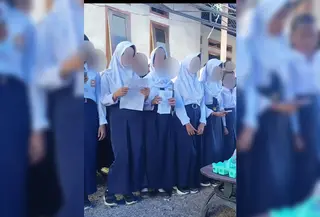 Sebuah video yang memperlihatkan sejumlah siswi berhijab menyanyikan lagu rohani viral di berbagai platform media sosial. (Liputan6.com/Fauzan)