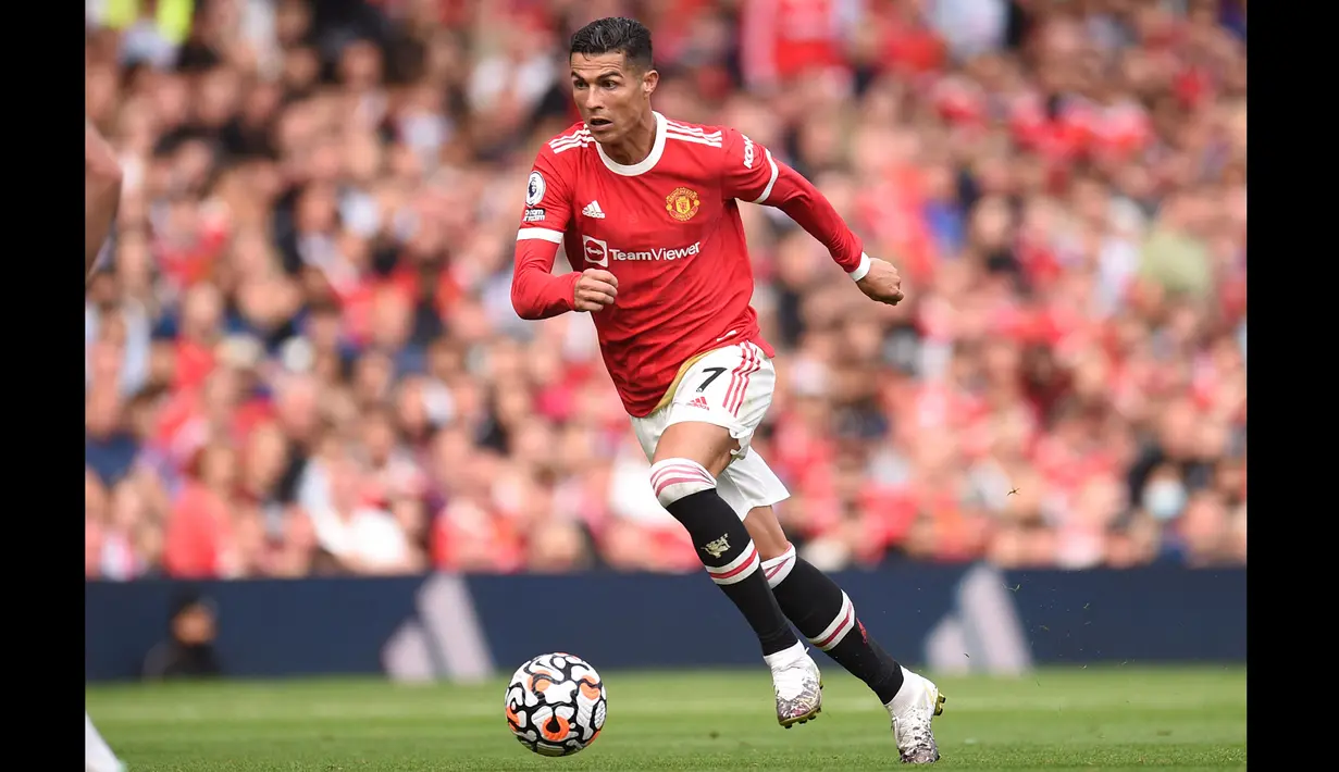 Catatan menarik pun tersaji usai Cristiano Ronaldo membobol gawang Newcastle. Ya, setelah 12 tahun dan 124 hari, ia kembali mencetak gol untuk Manchester United. (Foto: AFP/Oli Scarff)