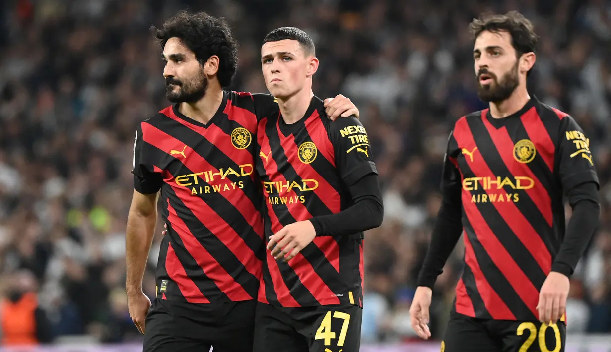 Hingga laga usai kedua tim gagal mencetak gol ke gawang masing-masing. Phil Foden dkk pun dipastikan lolos ke babak 16 Besar usai mengoleksi 10 poin dari 4 laga. Dengan dua laga tersisa, perolehan poin Manchester City sudah tak mungkin lagi terkejar oleh tim peringkat ketiga dan keempat, Sevilla dan FC Copenhagen yang baru mengoleksi 2 poin. (AFP/Jonathan Nackstrand)