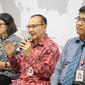 Ketua Satgas Waspada Investasi Tongam L Tobing (kedua kanan) menjelaskan tentang fintech di Indonesia, Jakarta, Rabu (12/12). Sedangkang P2P ilegal tidak menjadi tanggung jawab pihak manapun. (Liputan6.com/Angga Yuniar)