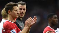 Ander Herrera berharap keberadaan David de Gea akan menentukan keberhasilan Manchester United (MU) meraih gelar. (AFP/Paul Ellis)
