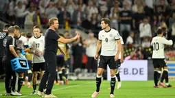 Timnas Jerman sukses meredam perlawanan Irlandia Utara dengan skor 3-1 di laga Grup A Kualifikasi Piala Dunia 2026 zona Eropa di RheinEnergieStadion, Jerman, pada 7 September 2025 waktu setempat atau Senin (8/9/2025) dini hari WIB. (INA FASSBENDER/AFP)