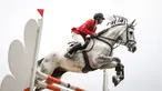 Atlet berkuda tim DNV Equestrian, Nusrtdinov Zayan Fatih beraksi pada nomor Show Jumping 90 cm saat ajang Solidarity Equestrian Challange 2022 yang berlangsung di Jakarta International Equestrian Park, Jakarta Timur, Minggu (30/01/2022). (Bola.com/Bagaskara Lazuardi)