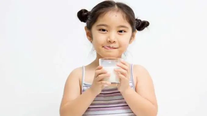 Minum susu/Copyright Shutterstock