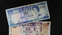 Mata uang poundsterling Inggris bergambar Ratu Elizabeth II. (AP)