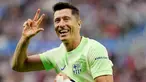 Penyerang Barcelona, Robert Lewandowski, melakukan selebrasi setelah mencetak gol ke gawang Alaves pada laga pekan ke sembilan Liga Spanyol di Stadion Mendizorroza , Minggu (06/10/2024). (AFP/Cesar Manso)