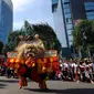 Penari Reog Ponorogo beraksi saat pelaksanaan Car Free Day di kawasan Jalan Jenderal Surdirman, Jakarta, Minggu (13/3/2016). Penampilan Reog Ponorogo ini sosialisasi menuju pengakuan UNESCO sebagai warisan budaya dunia. (Liputan6.com/Helmi Fithriansyah)