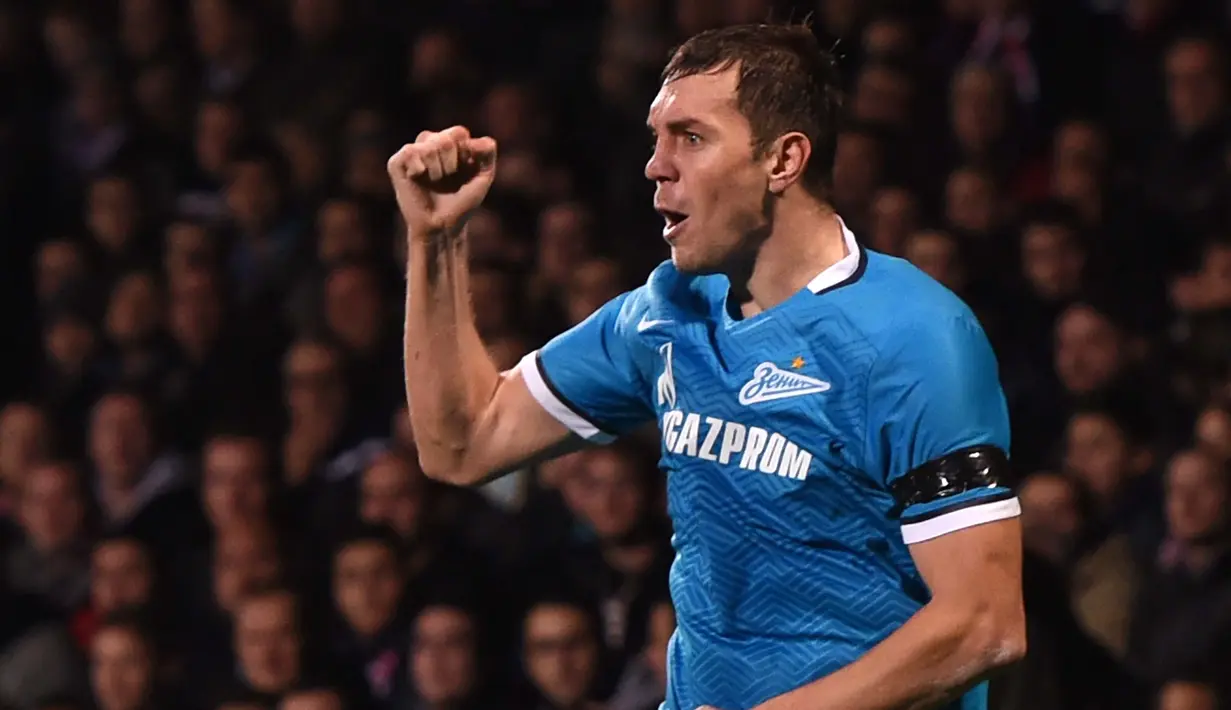Pemain Zenit Saint-Petersburg,  Artem Dzyuba menempati urutan ke tiga dengan total 6 gol. (AFP Photo/Philippe Desmazes)