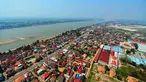 Foto yang diabadikan dari udara pada 7 Maret 2013 ini menunjukkan pemandangan Vientiane, ibu kota Laos. Laos merupakan satu-satunya negara yang terkurung daratan di Asia Tenggara. (Xinhua/Alan Liu)