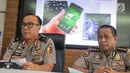 Karopenmas Divisi Humas Polri Brigjen Pol Dedi Prasetyo (kiri) memberikan keterangan saat rilis kasus pemberitaan hoax di Jakarta, Senin (1/7/2019). Dalam pengungkapan kasus tersebut kepolisian menangkap pelaku penyebar berita hoax dengan akun media sosial bernama /rif_oposite. (Liputan6.com/Faizal