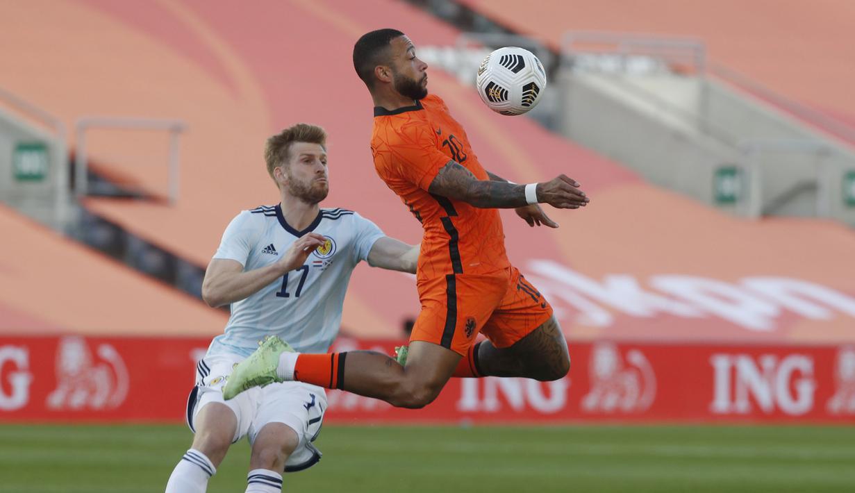 Pada 10 menit pertama, Belanda belum menemukan ritme permainan mereka. Pada sisi lain, Skotlandia tampil dengan permainan apik dan berbahaya. (Foto: AP/Miguel Morenatti)