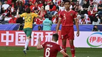 Timnas Indonesia tersingkir dari Piala Asia 2023 setelah kalah 0-4 dari Timnas Australia di babak 16 besar. (Bola.com/Dok.AFP/HECTOR RETAMA).