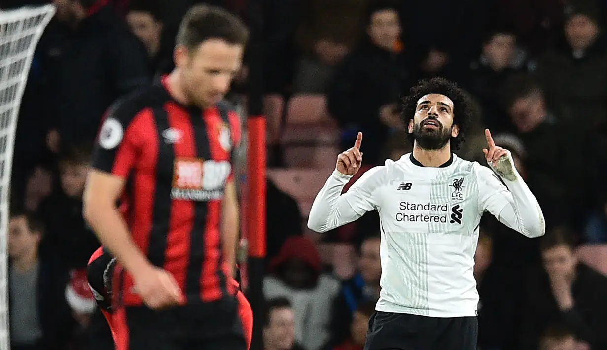 1. Mohamed Salah (Liverpool) - 14 Gol. (AFP/Glyn Kirk)
